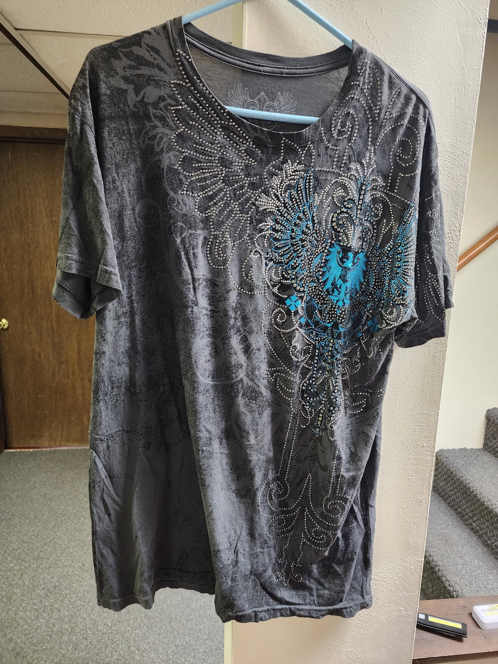 Vintage Men's Xzavier Y2K Black Graphic Tee with Blue Crest